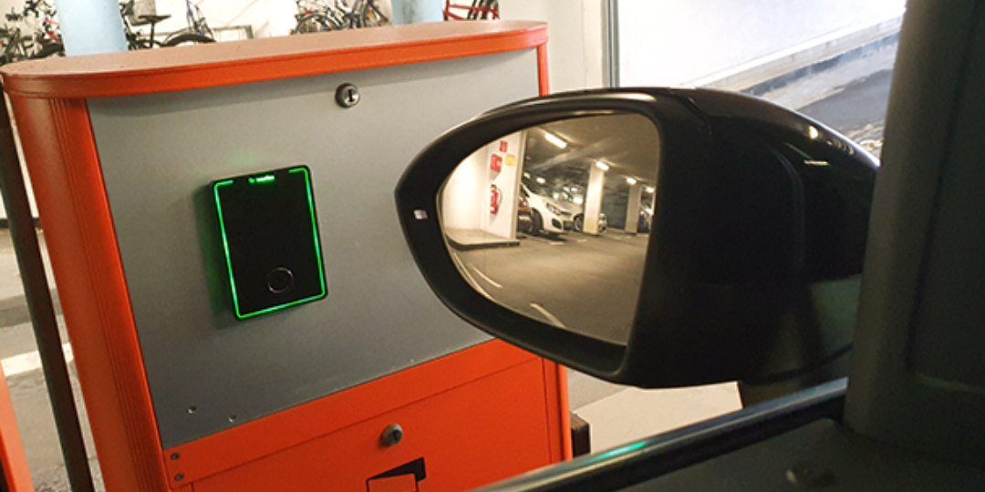 Interflex access terminal at barrier in car park